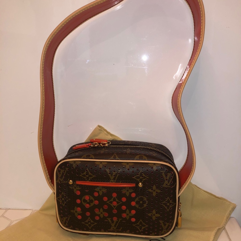 LOUIS VUITTON Orange Perforated Trocadero UNUSED limited edition and RARE